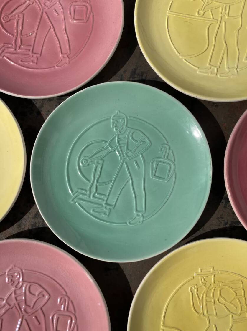 7 multicolored plates with old Nyon porcelain trades