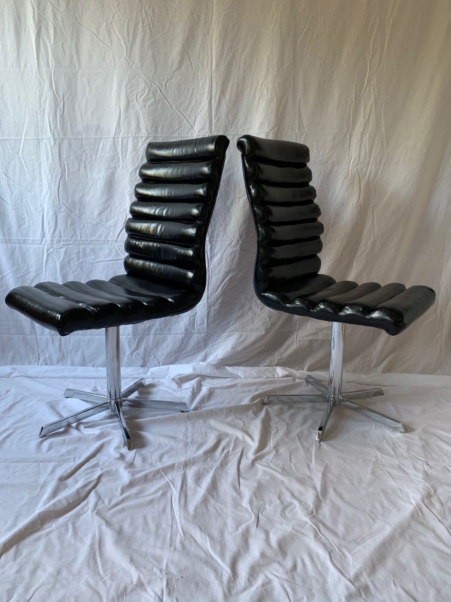 A set of four leather chairs, Italy, 80s