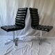A set of four leather chairs, Italy, 80s