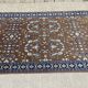 Tapis pakistanais en laine fait main - L=1m75 l=1m27..