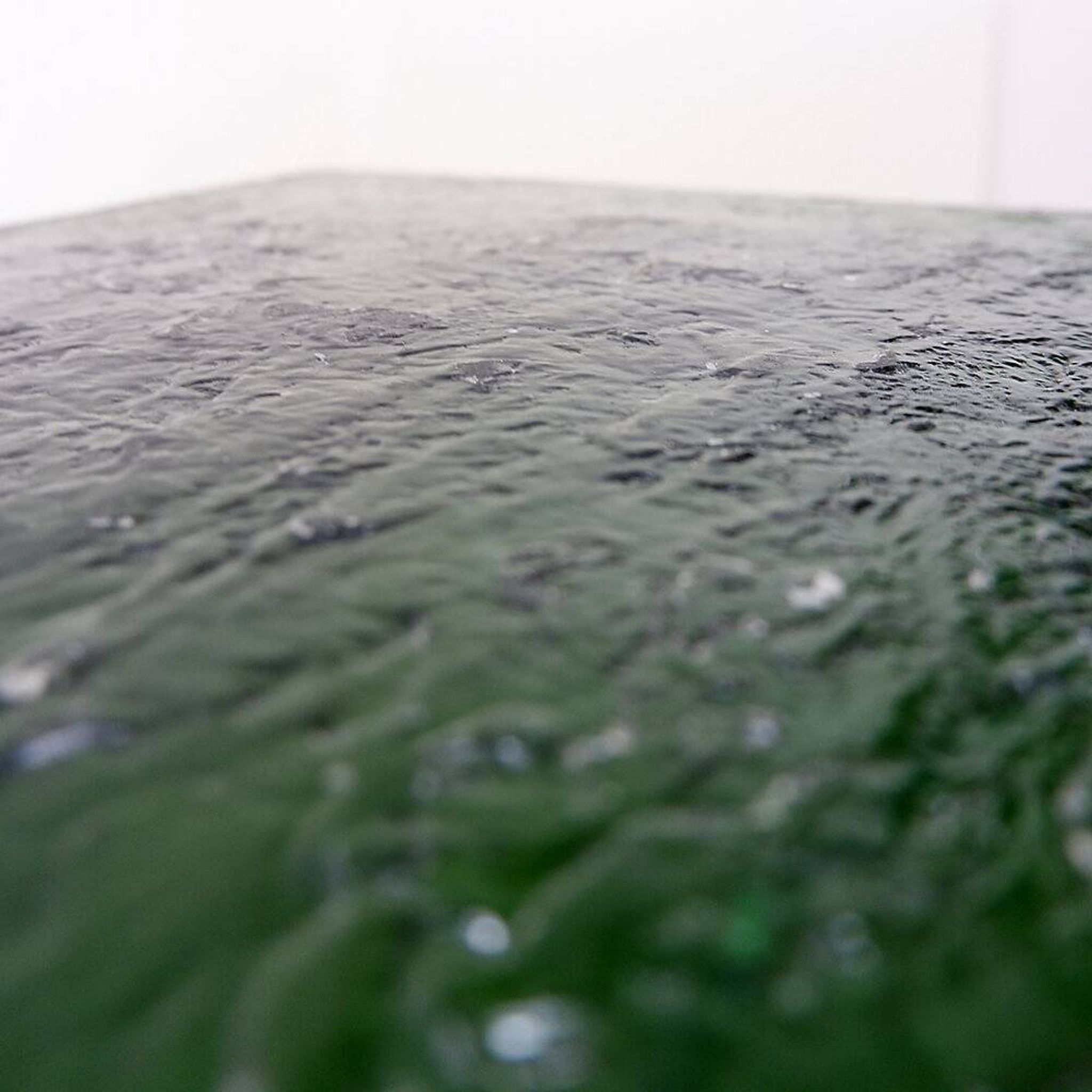 Translucent bottle green acrylic base