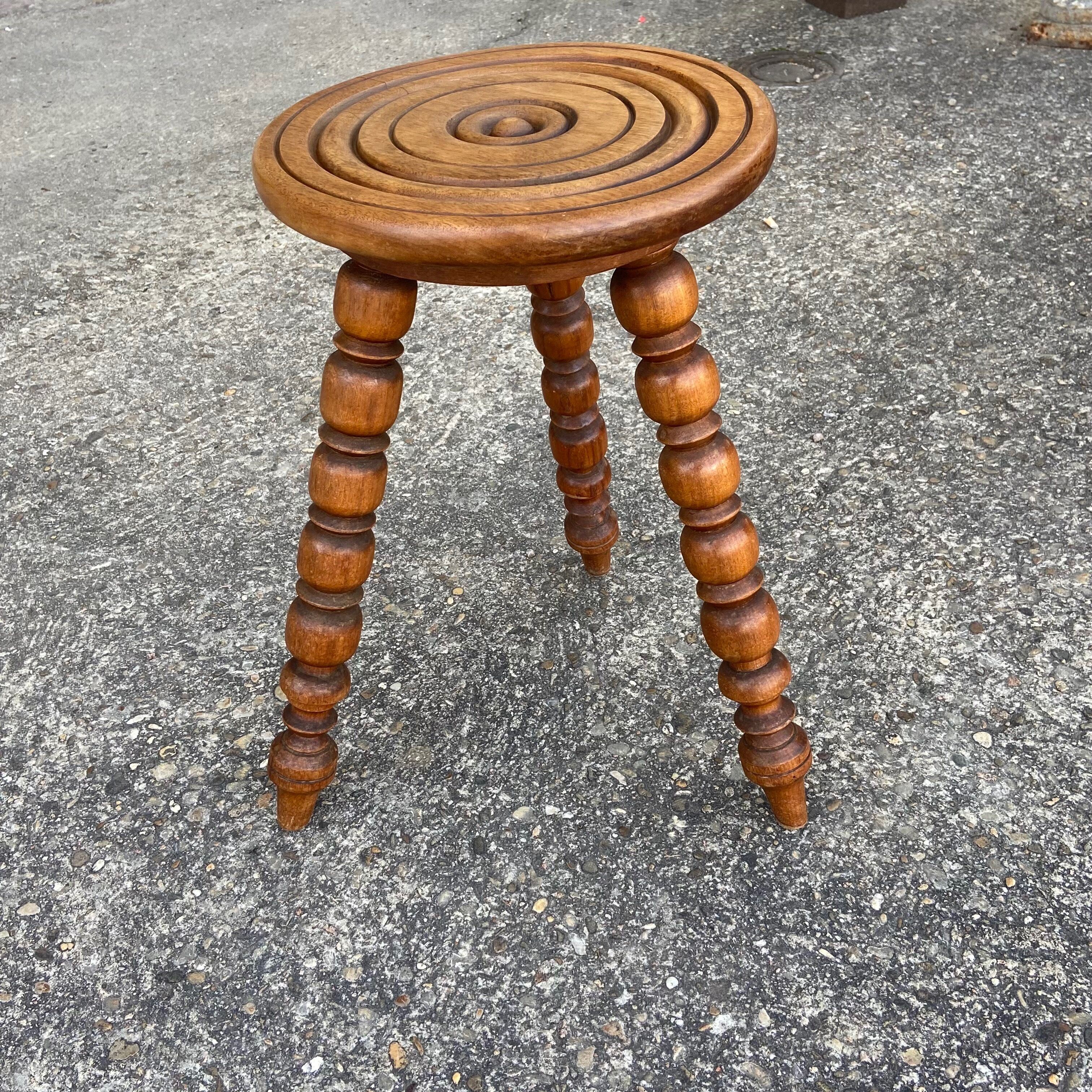 Turned wooden tripod stool