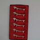 6 silver plated basset knife holders