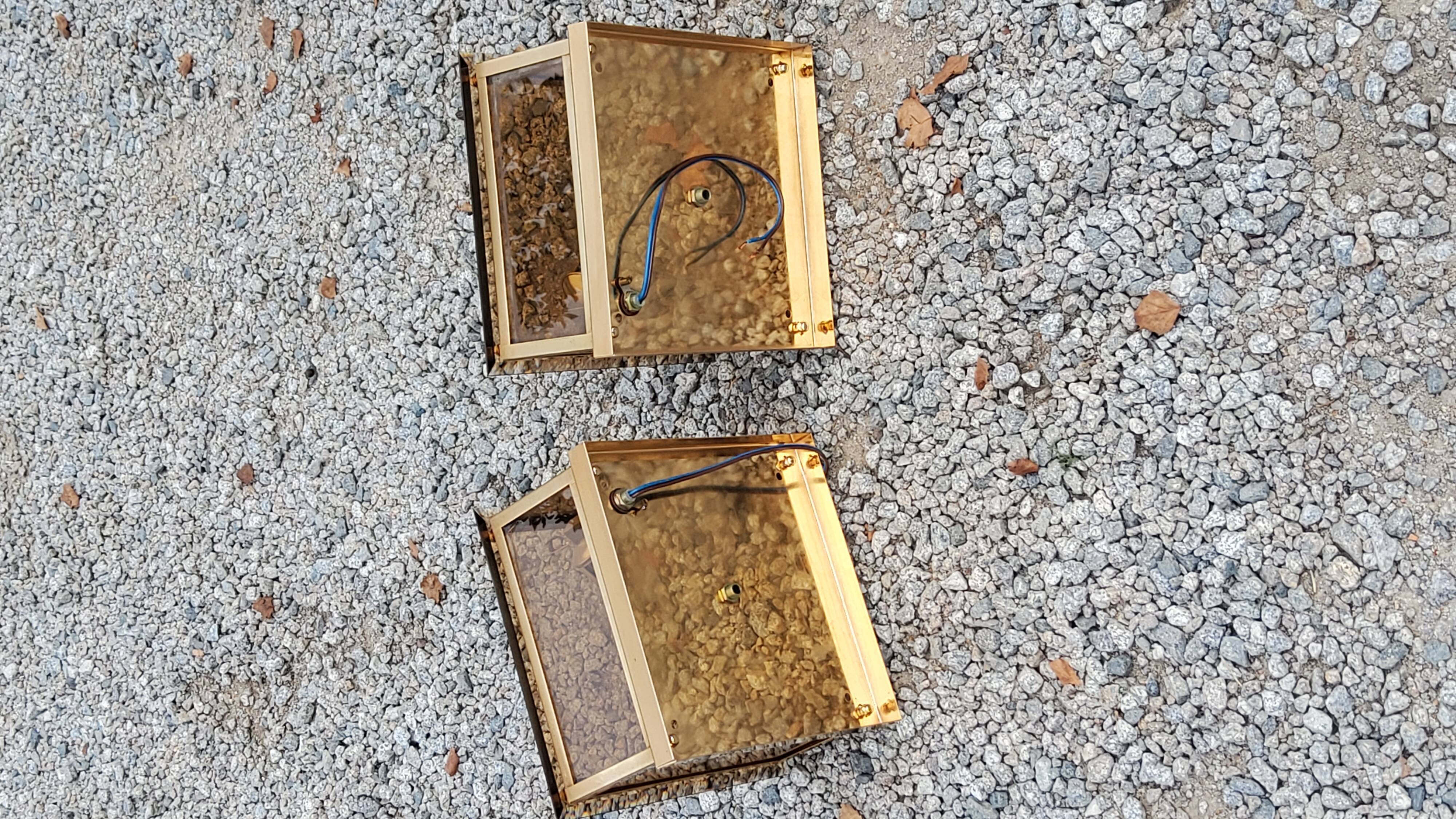 Pair of wall lamps in smoked glass and gilded metal from the 70s/80s