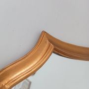Vintage baroque mirror in gilded wood
