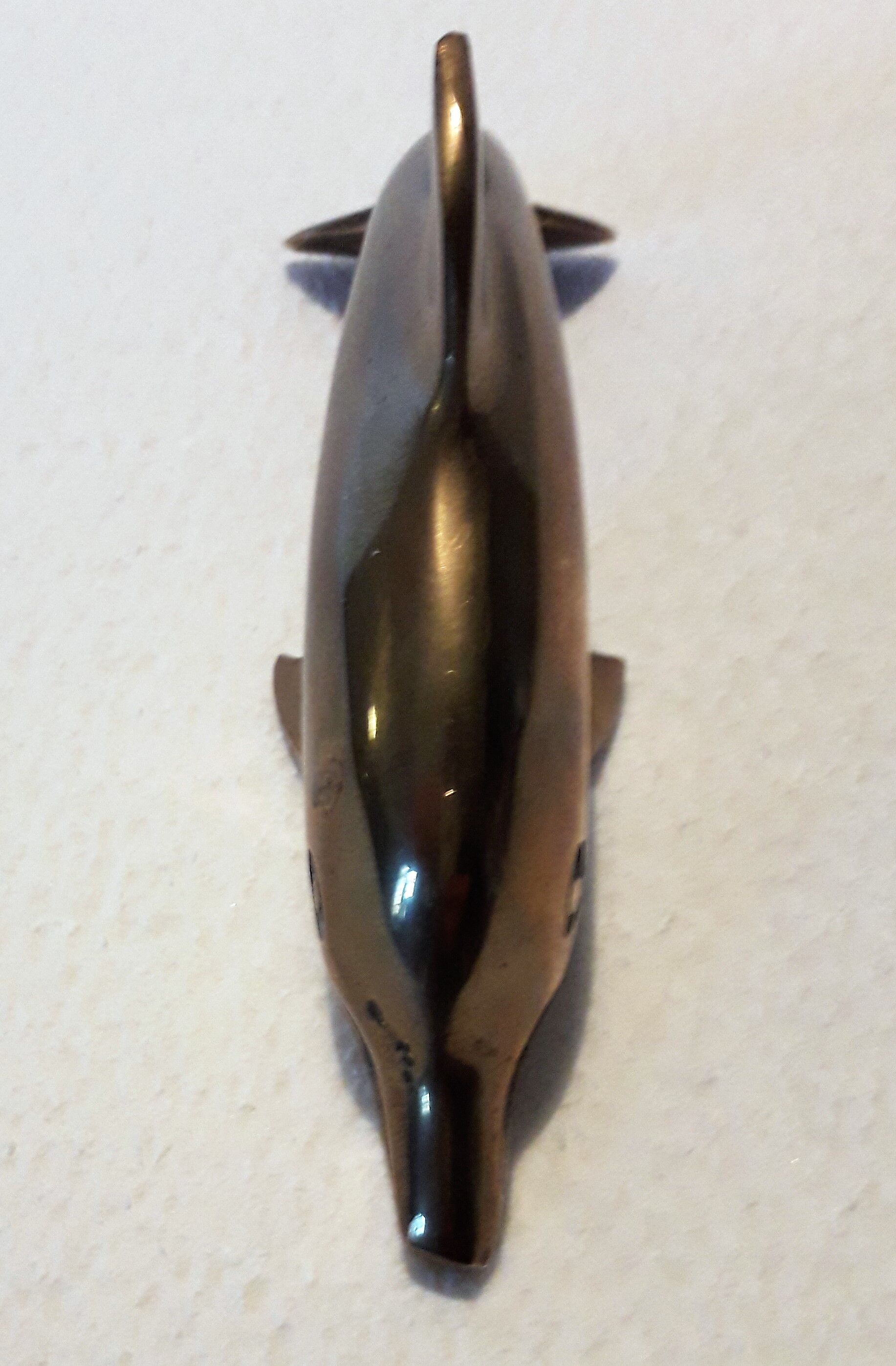 Brass dolphin