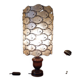 Table lamp with wooden base and mother-of-pearl fish and brass lampshade