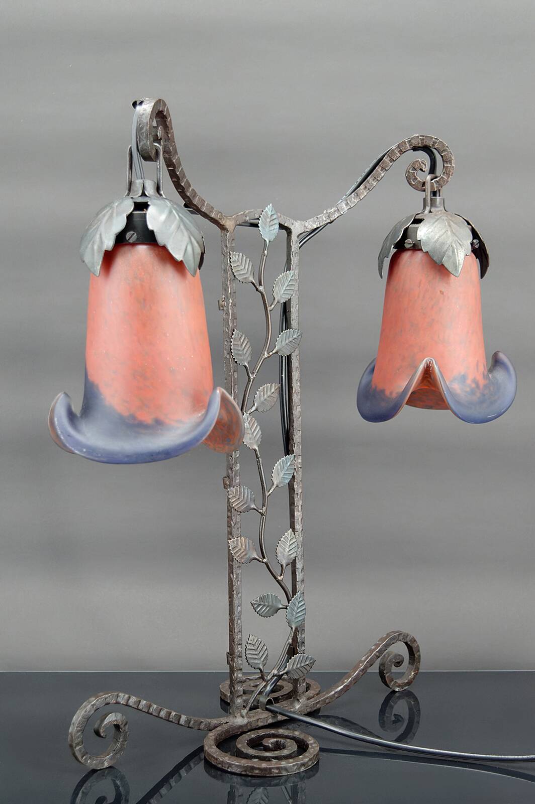 Two-headed wrought iron lamp by Muller, Art Deco, France, Circa 1920