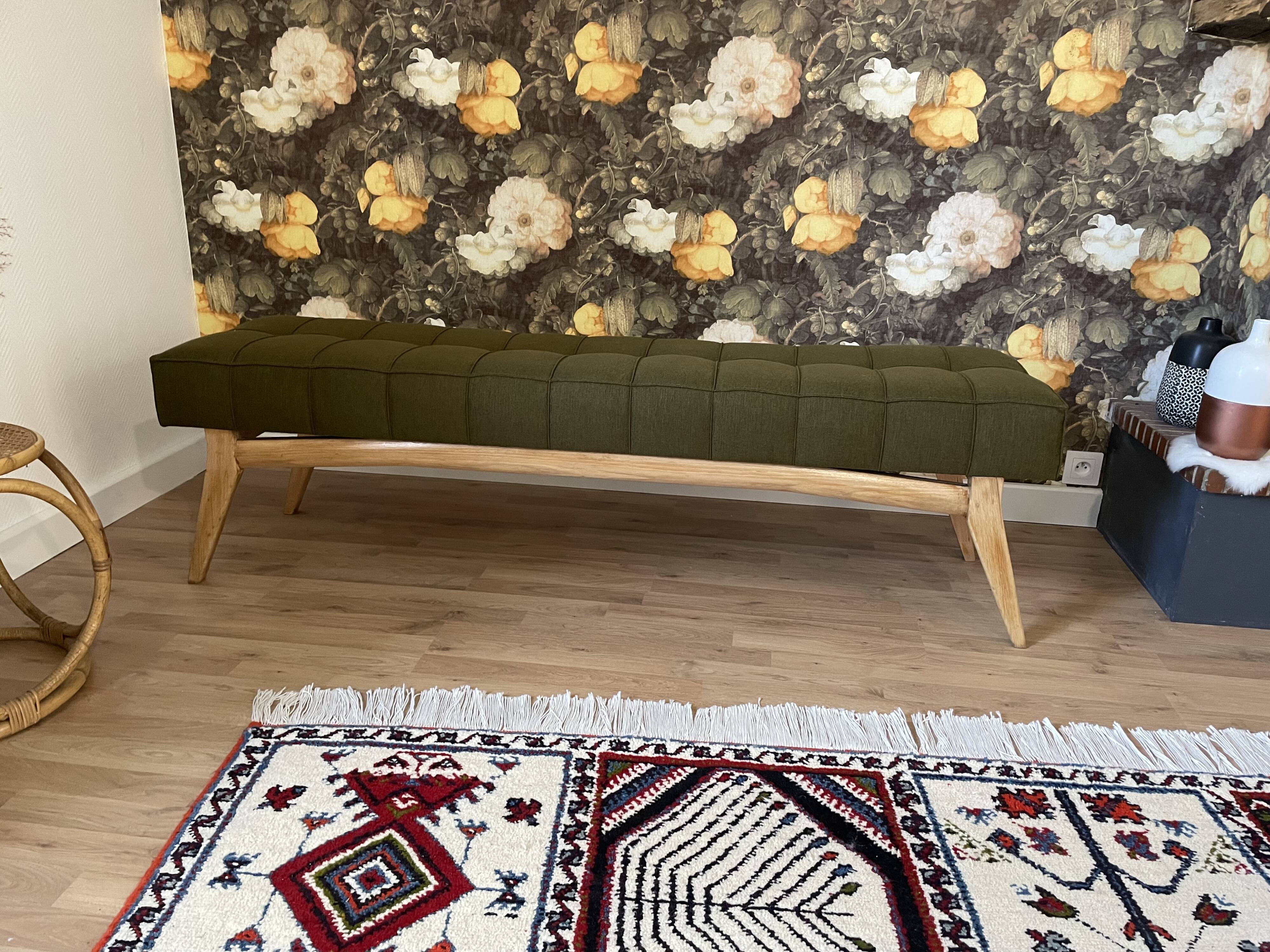 Wooden bench and green fabric