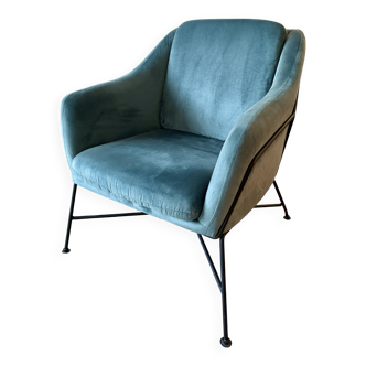 Velvet armchair with exposed structure