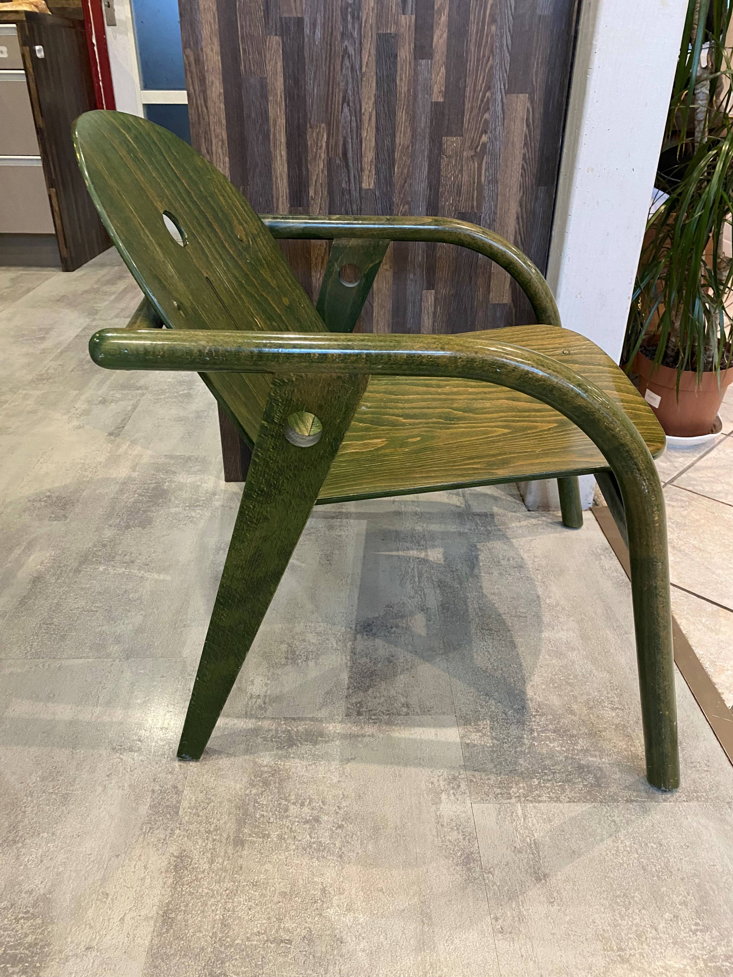 Fauteuil Baumann vert, années 70