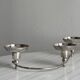 Shiny stainless steel candlestick holder