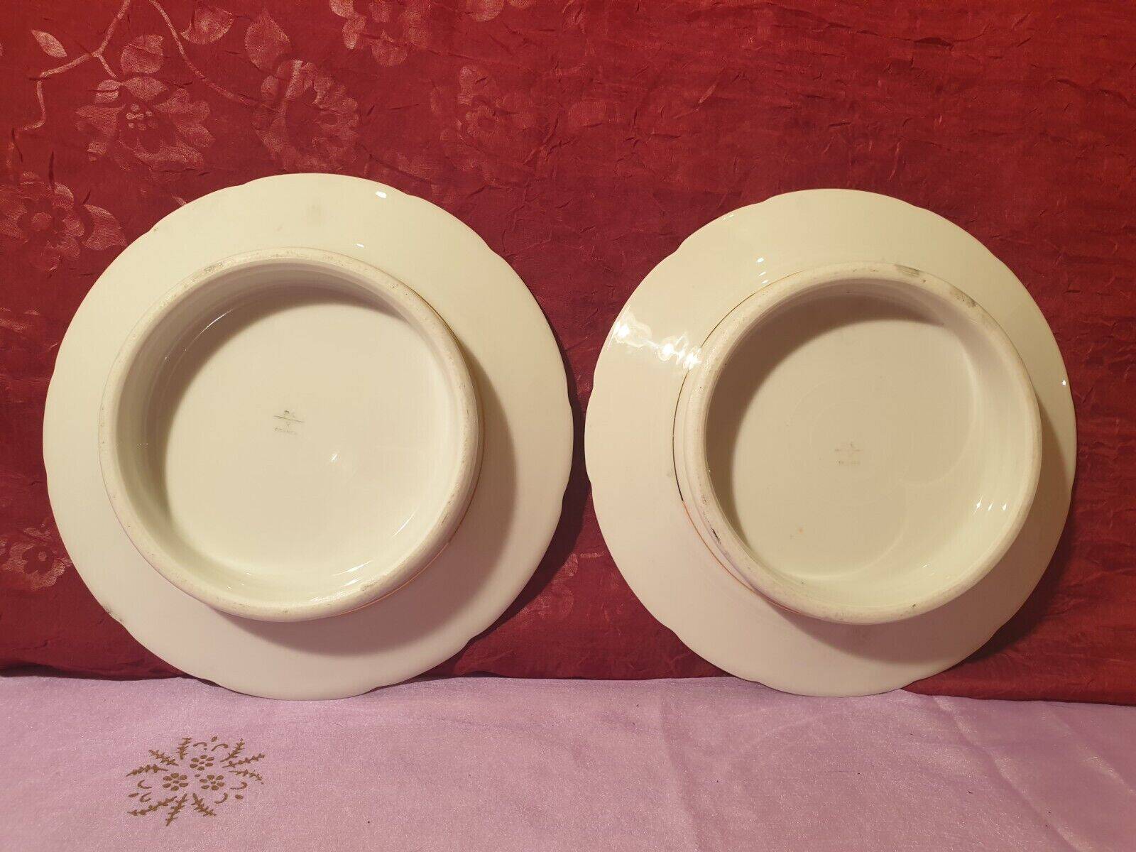 Two white and gold porcelain fruit bowls PLV France