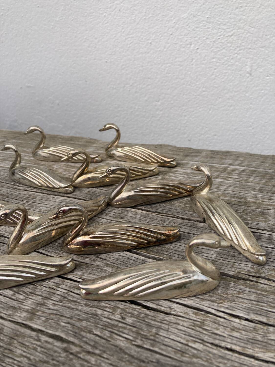 12 duck knife holders in silver metal