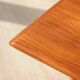 Vintage Scandinavian coffee table in teak and rattan – Danish design from the 1960s.
