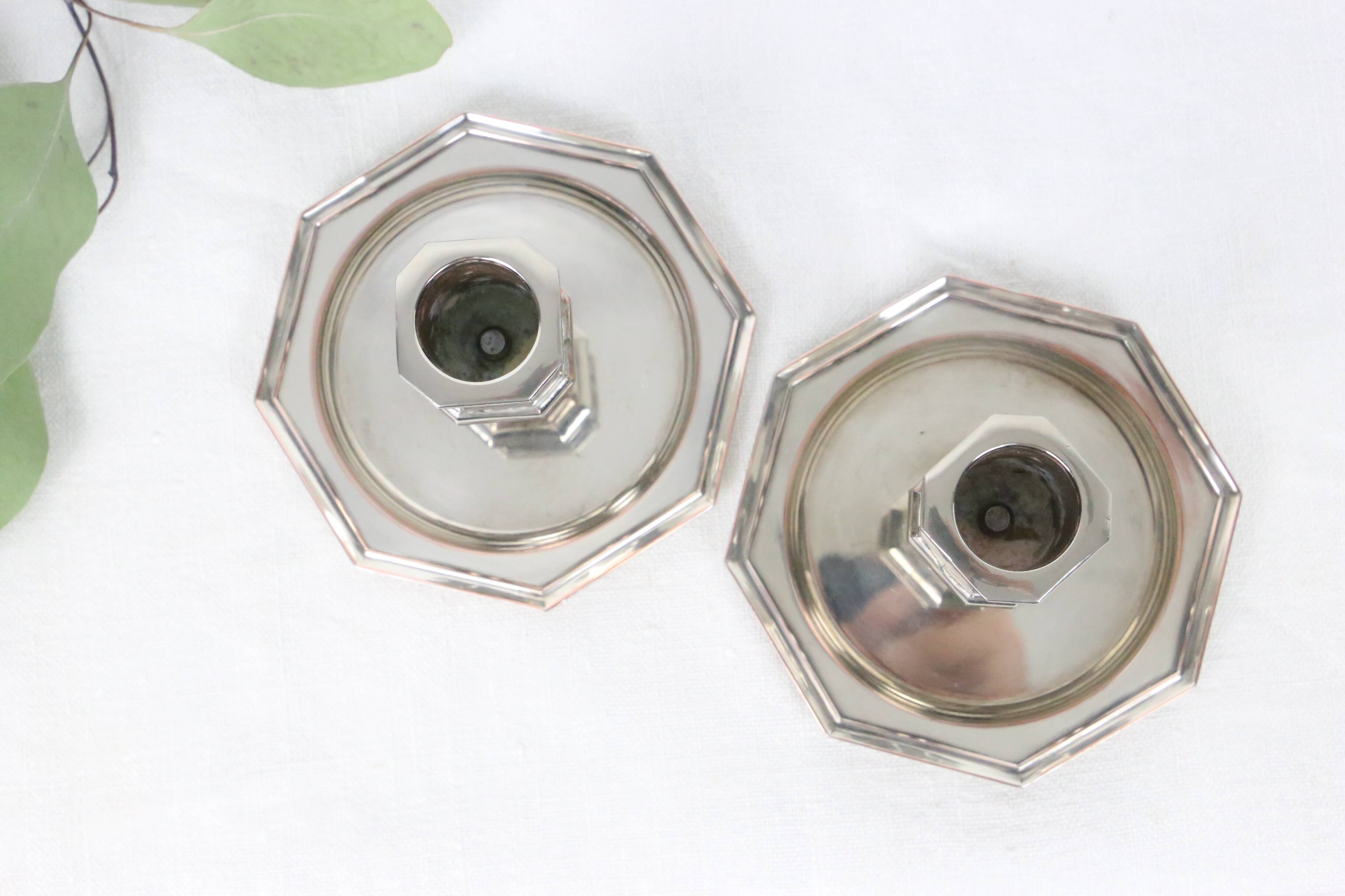 Pair of silver-plated metal candlesticks