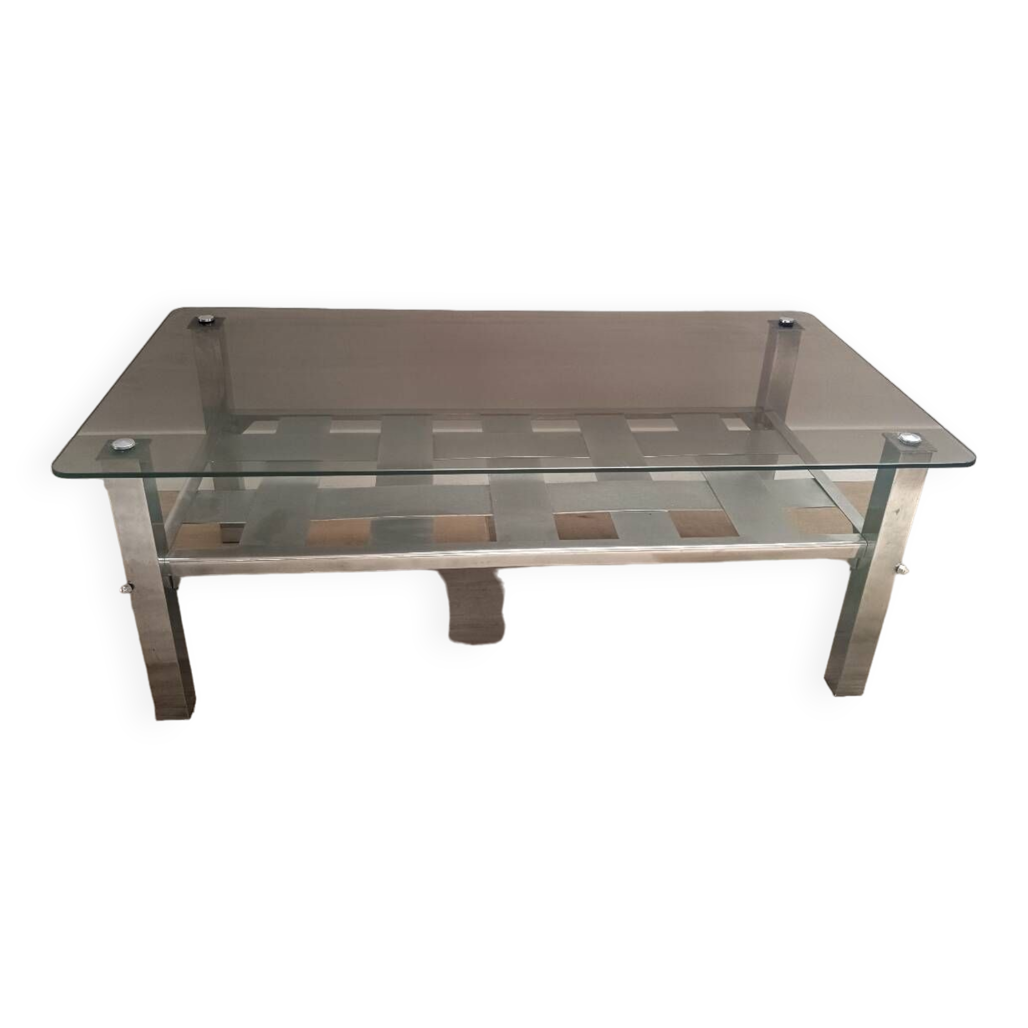 Vintage smoked glass coffee table with chrome legs.