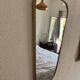 Miroir vintage 1960 rétroviseur asymétrique doré noir - 73 x 39 cm