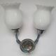 Applique zoomorphe ancienne en laiton argenté et globes opalins