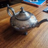 Silver-plated metal teapot in English style