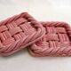 Woven pair of bottle coasters, in pink Vallauris earthenware.
