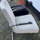Paire de fauteuils en acier tubulaire