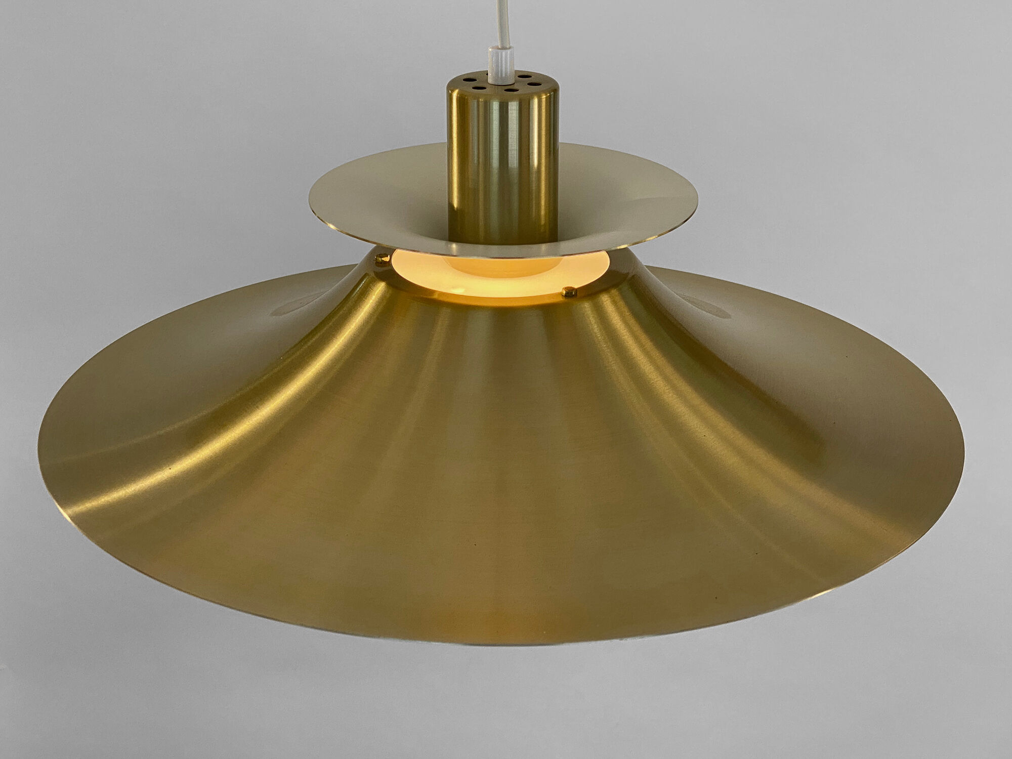 Golden colored aluminum pendant light from Frandsen Lighting. Denmark 1970s