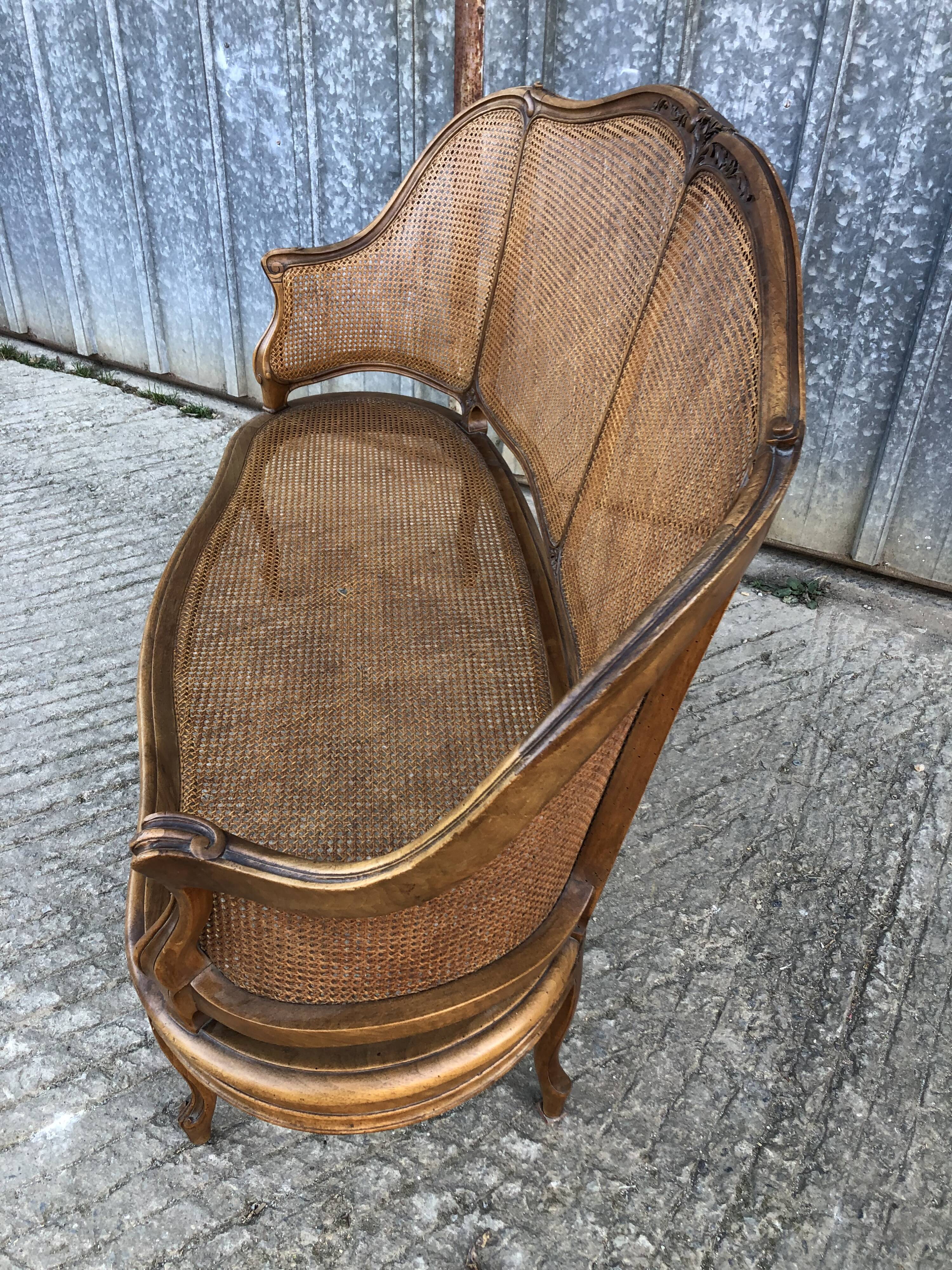 Antique Louis XV bench in solid walnut and caning