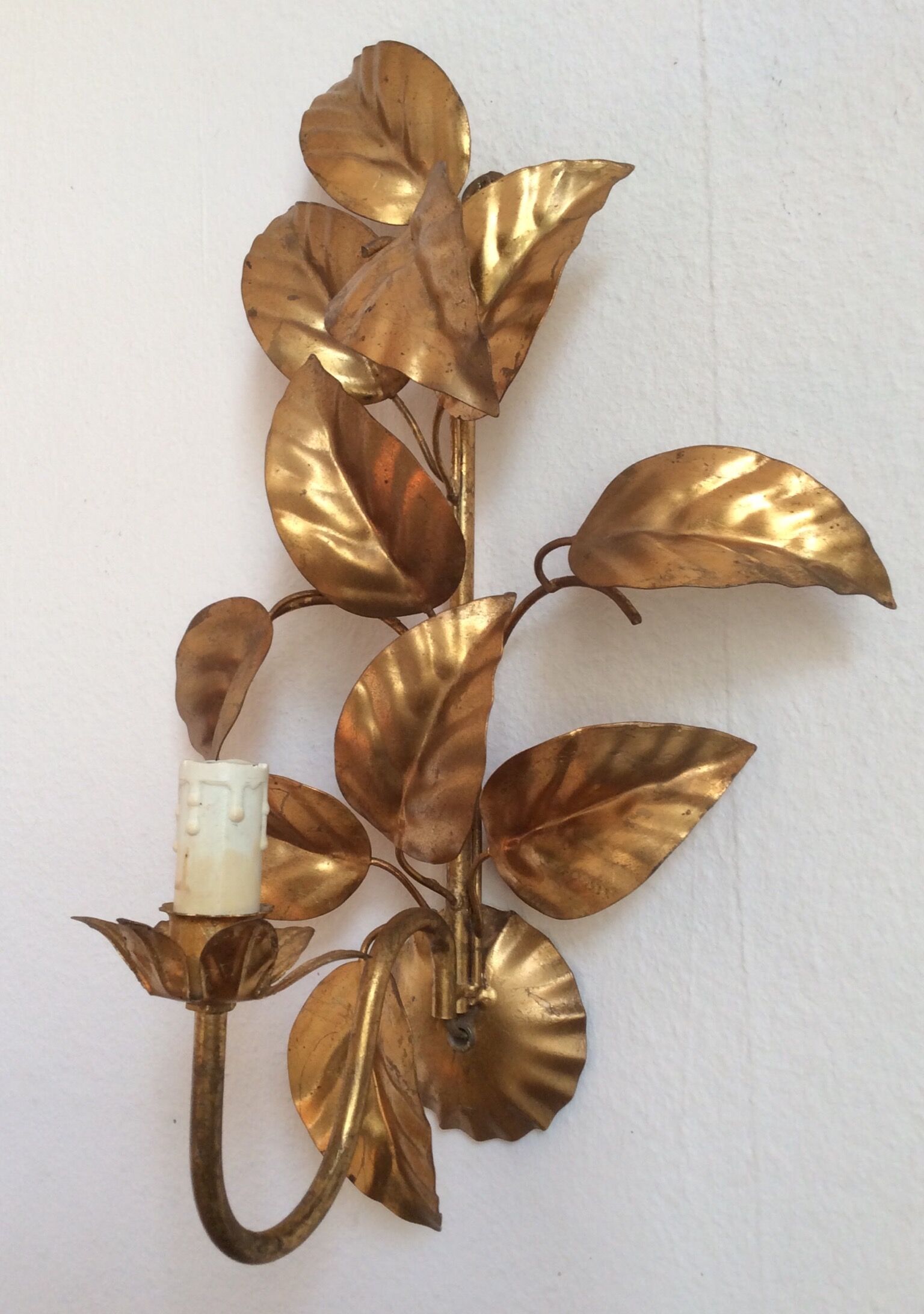 Apply gold metal sheets, Hans Kolg