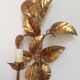 Apply gold metal sheets, Hans Kolg