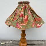 Turned wood lamp with flower shade