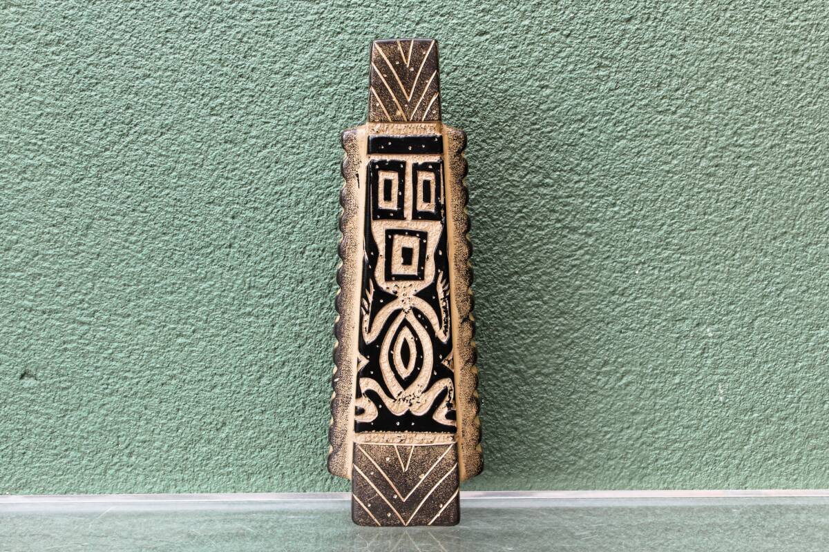 Modernist ceramic vase, signed, with incised geometric tribal decoration.