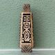 Modernist ceramic vase, signed, with incised geometric tribal decoration.