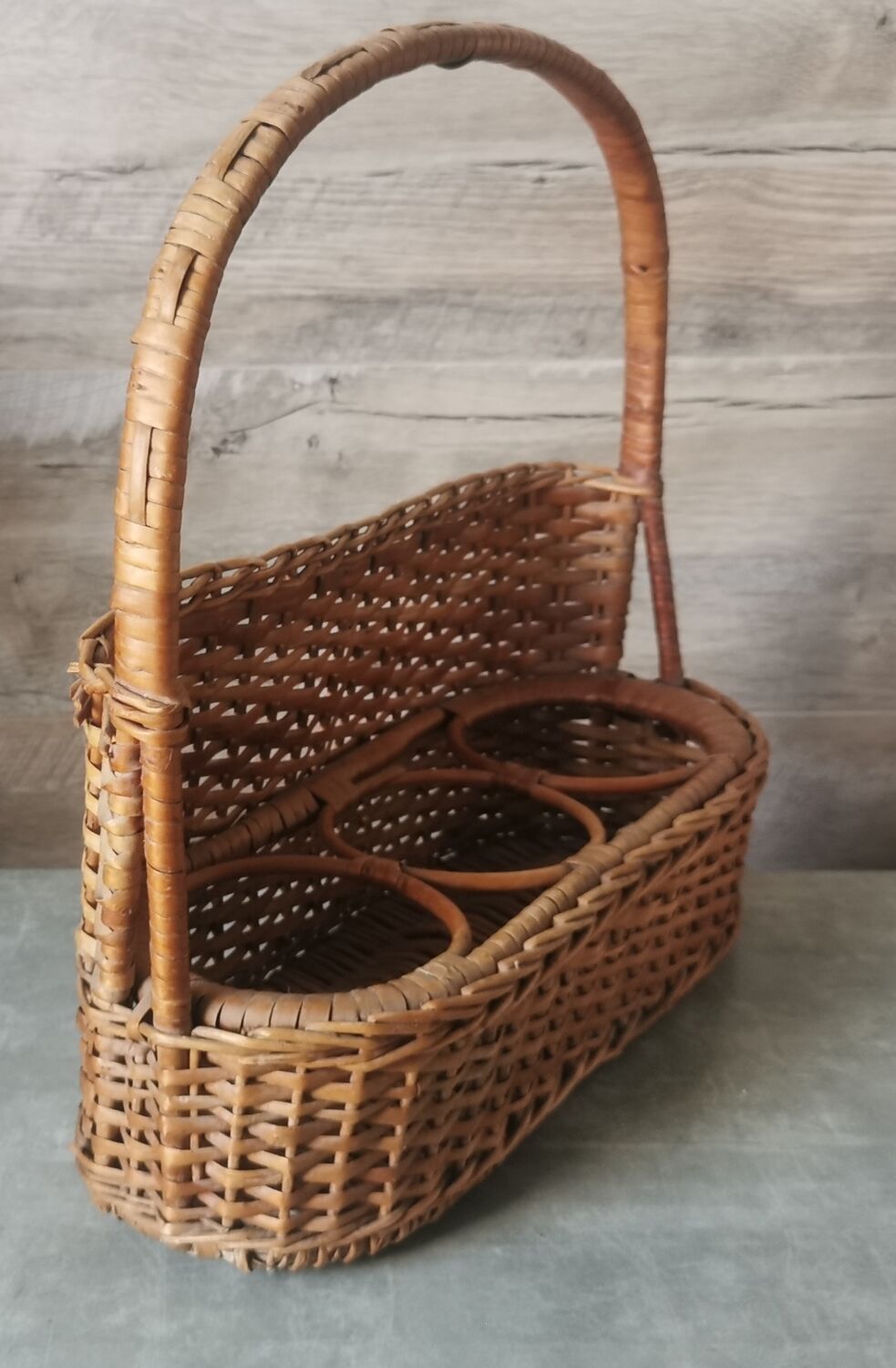 Vintage wicker bottle rack