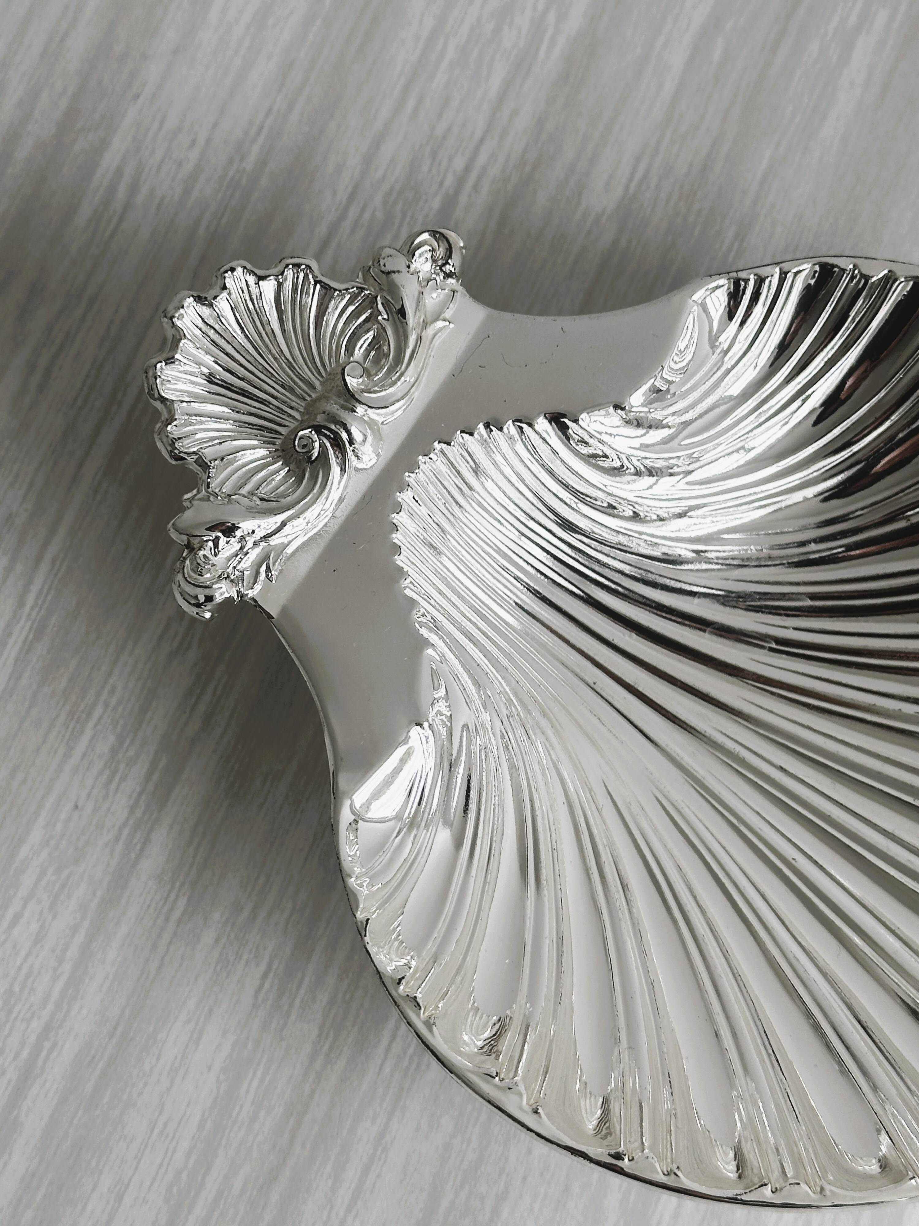 soap dish or jewelry holder in shiny metal