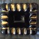 Black ashtray and ceramic gold 50s