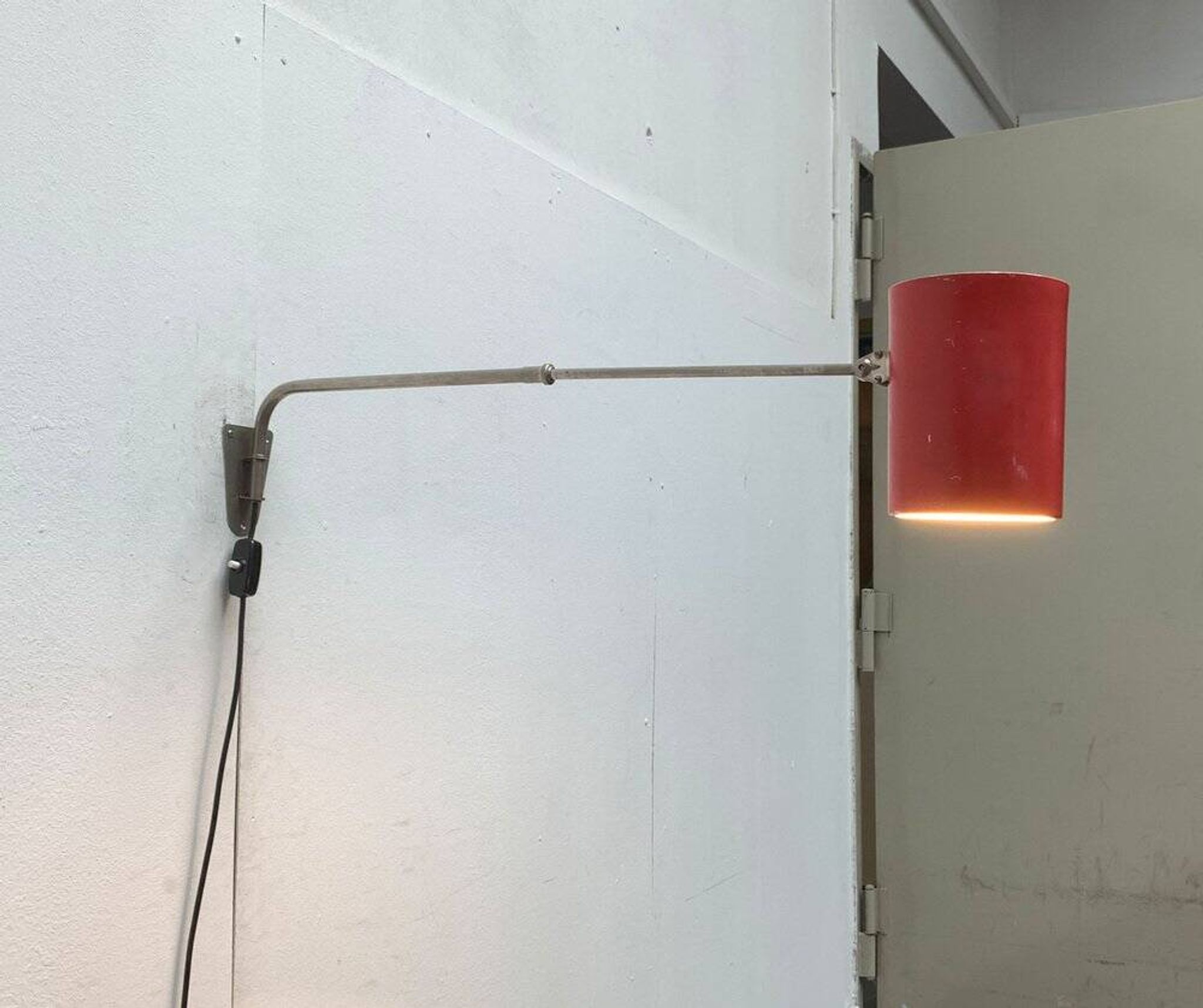 German minimalist wall lamp from the mid-century by Hala, 1960s.