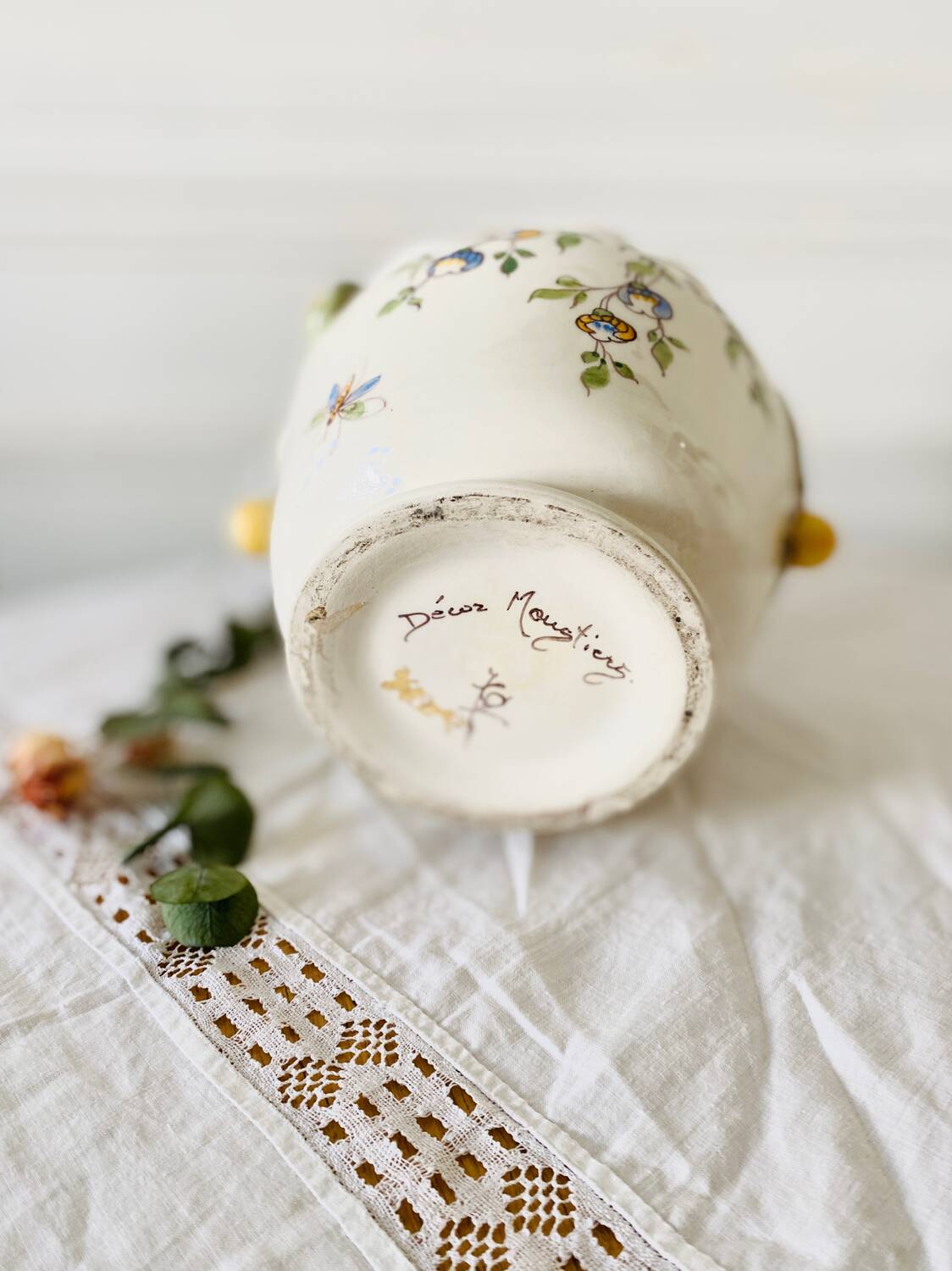 Old earthenware pot cover from Moustiers, hand decorated