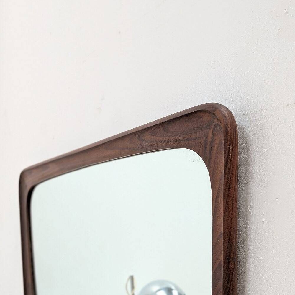 Vintage Scandinavian teak mirror from the 1960s.