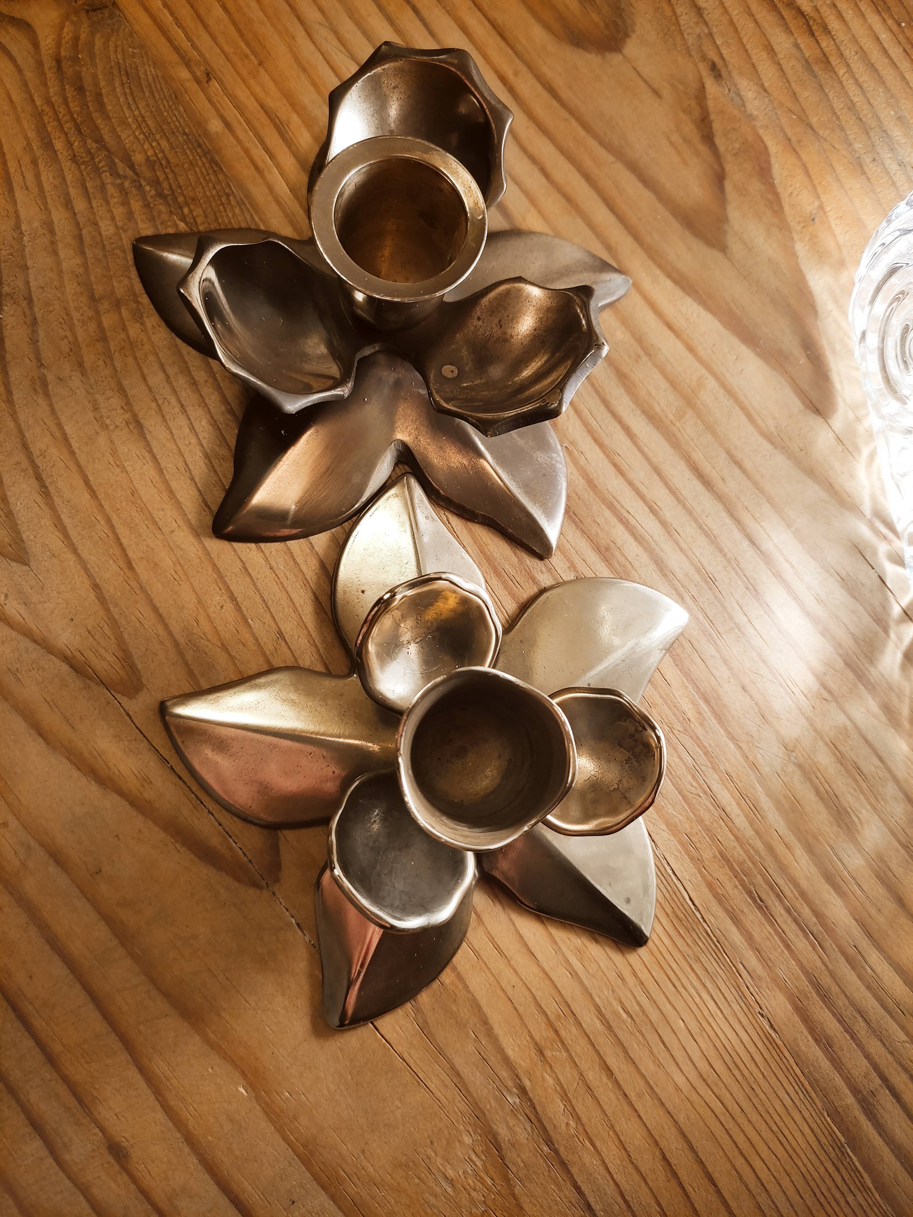 Duo of brass star candle holders