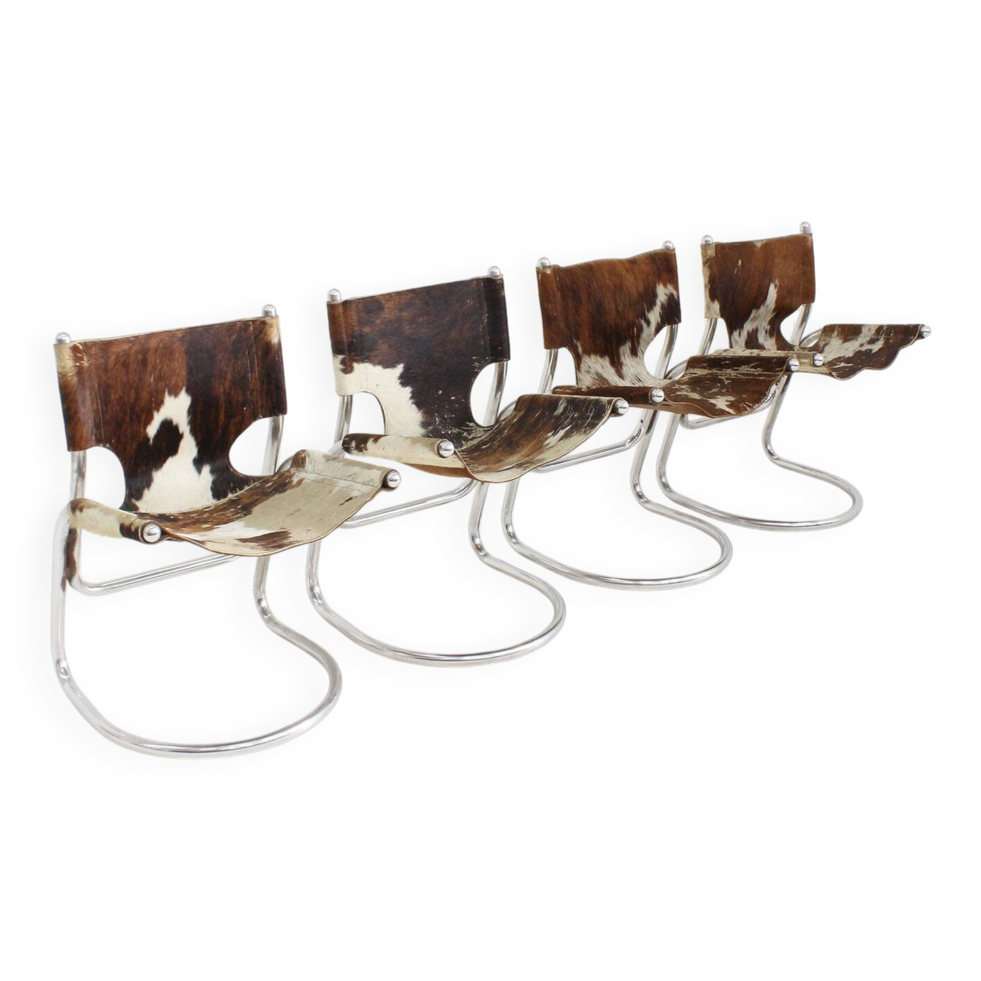 Vintage dining room chairs chrome and cowhide by Parravicini Fratelli