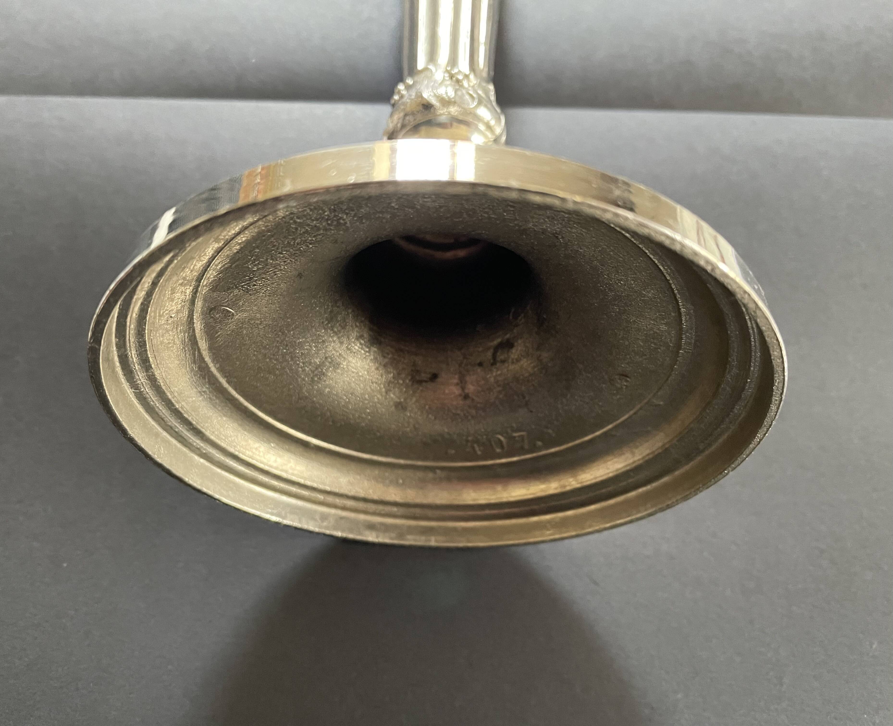 Antique silver-plated candlesticks in classic style