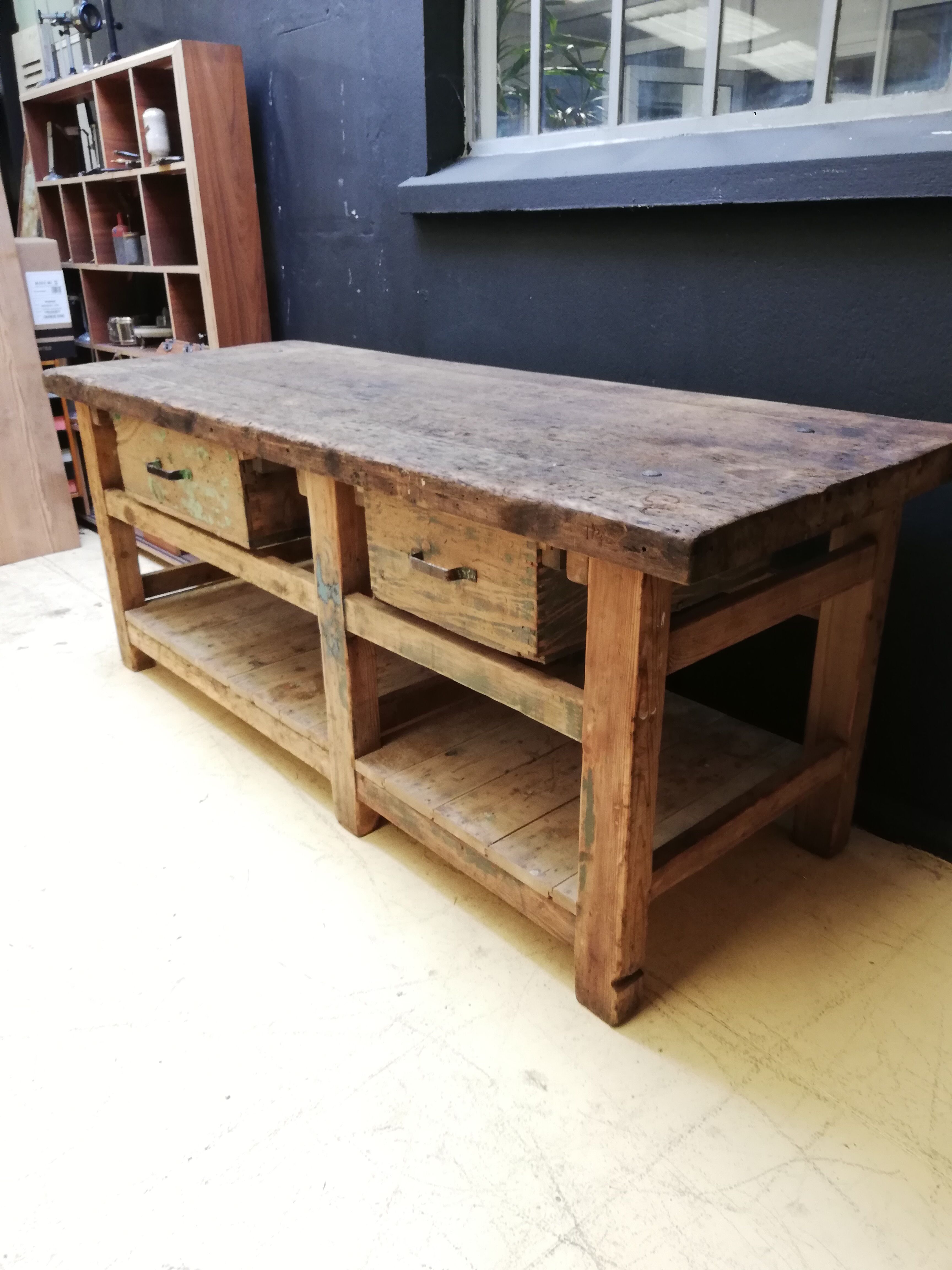 Old vintage wooden carpenter's workbench, industrial decoration