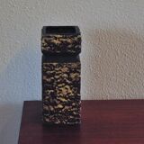 Vintage brown vase in yellow relief.