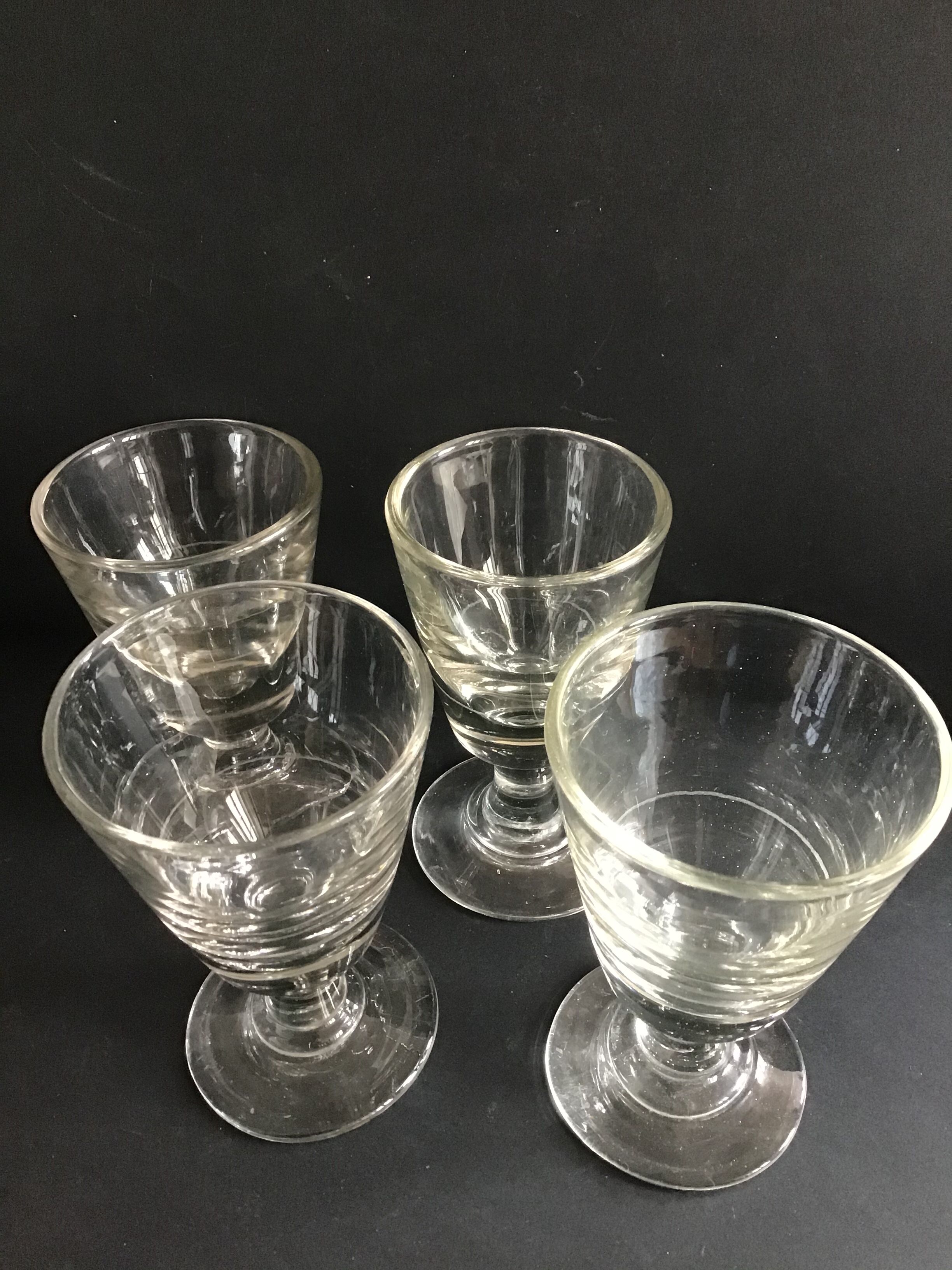 Suite of 4 thick old glasses