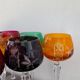 Série de 10 verres anciens multicolores en cristal ciselé