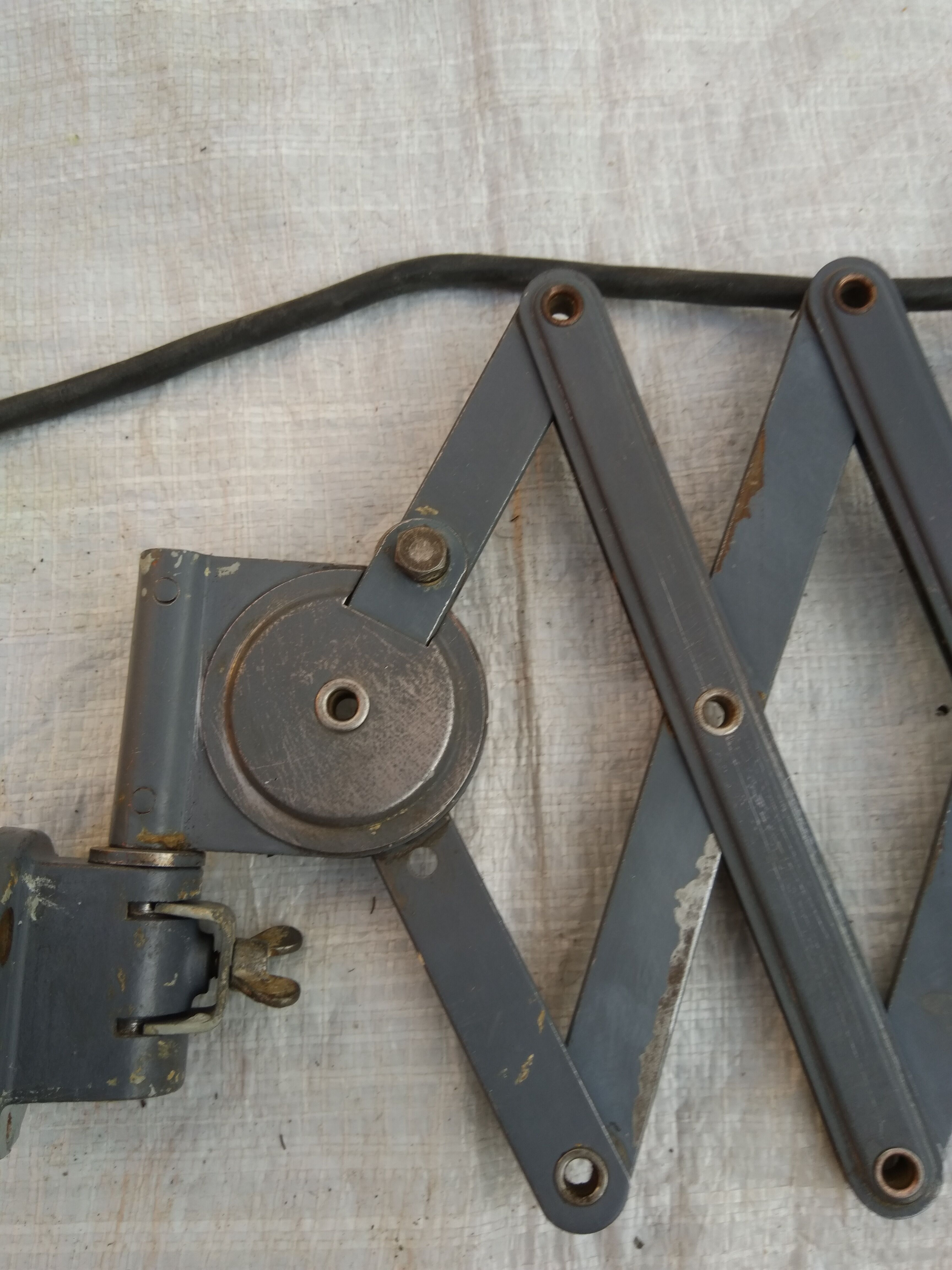 Industrial scissors sconce