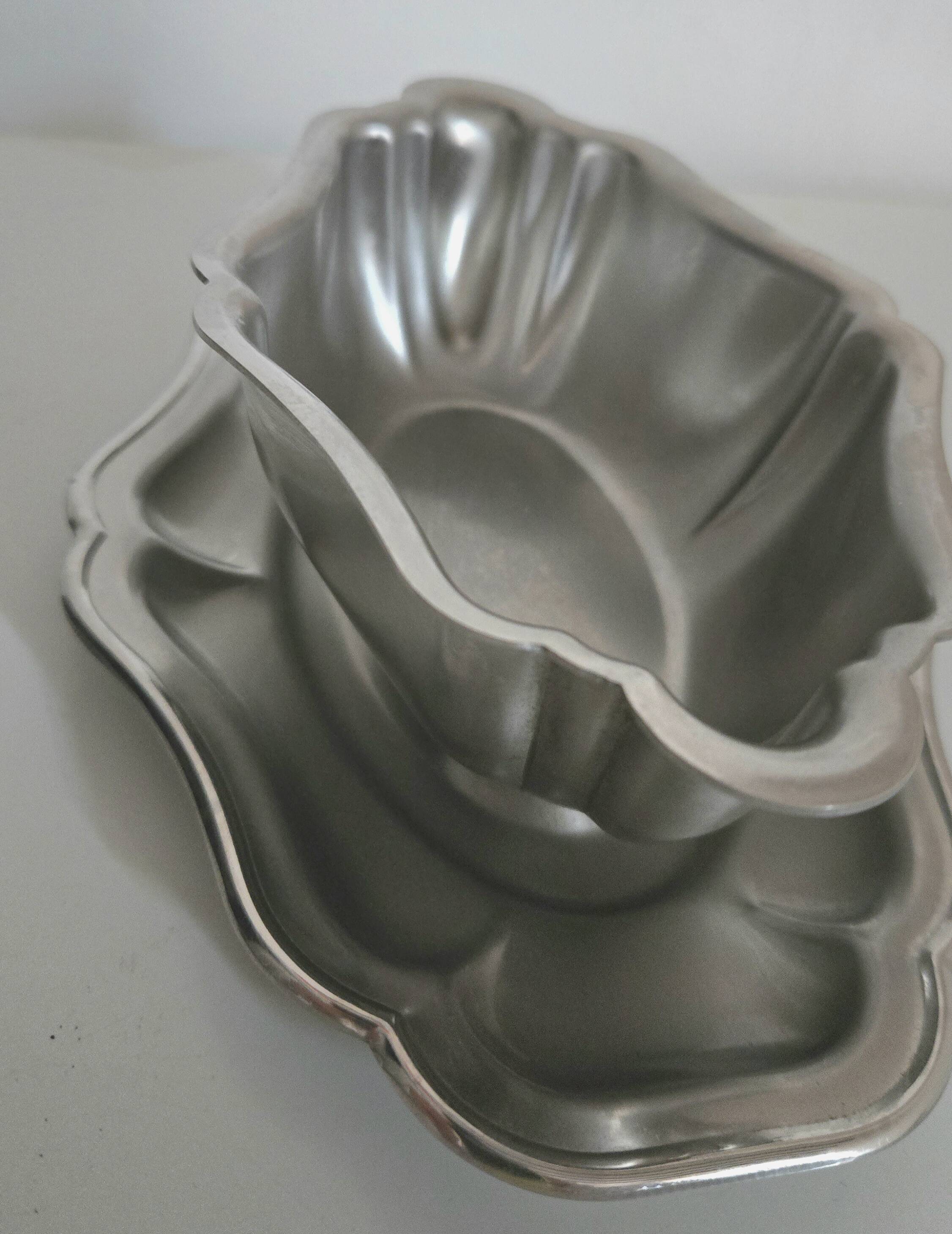 Patinated stainless steel sauceboat