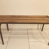 Old bench wooden slats and tubular metal base