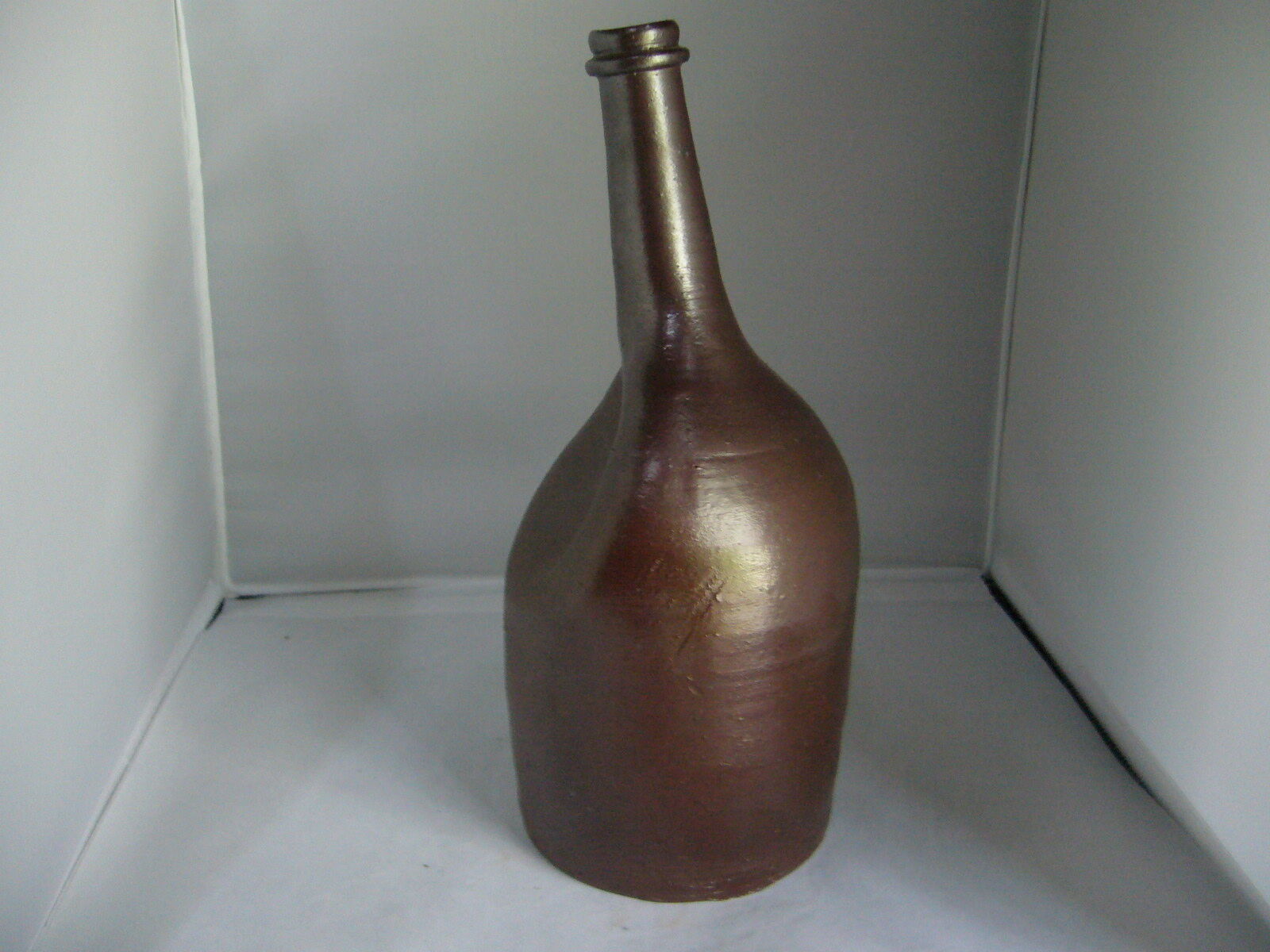 terracotta bottle varnished of particular shape